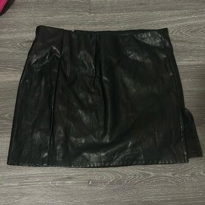 Black mini skirt with one slit
